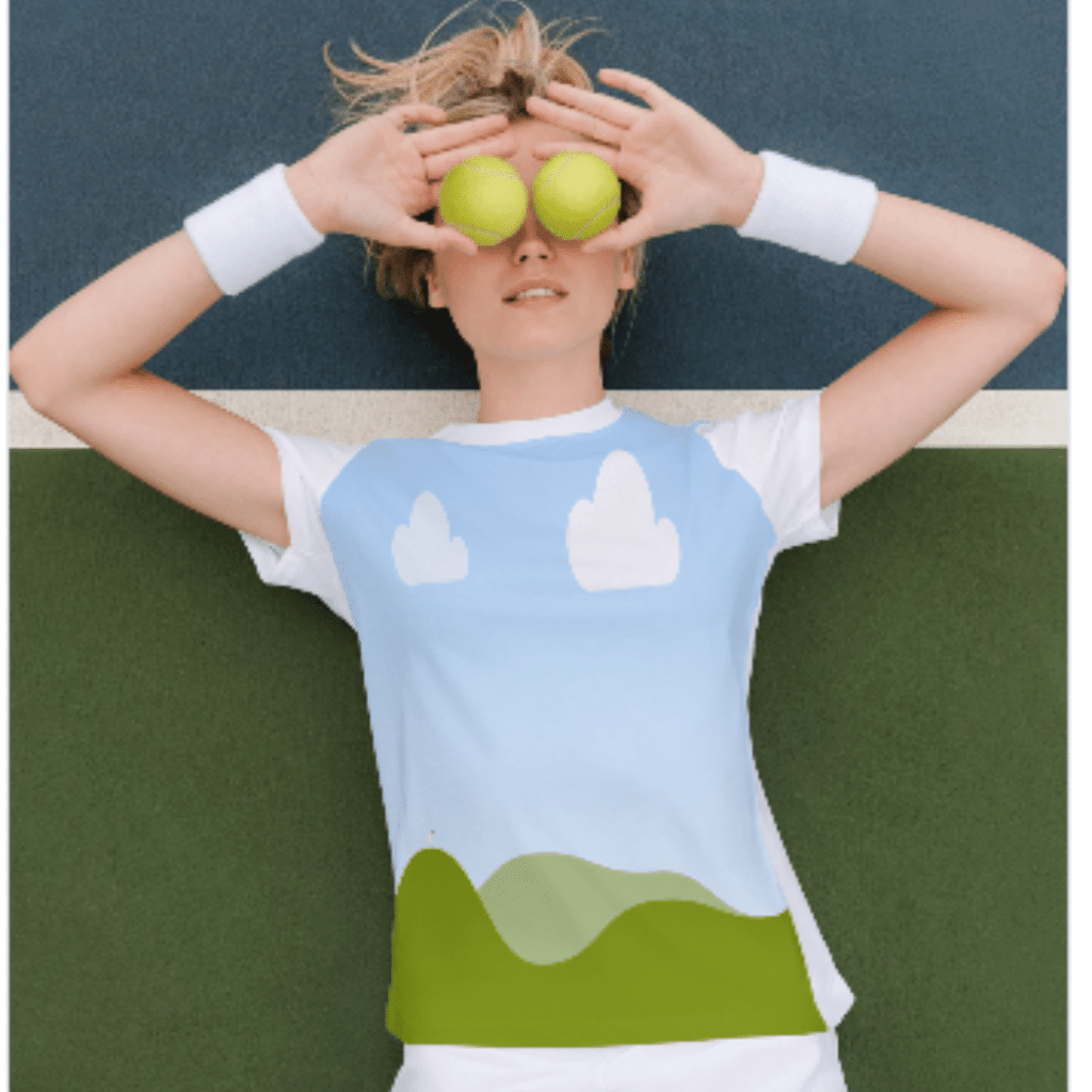 Tennis Girl holding two balls in front of her eyes