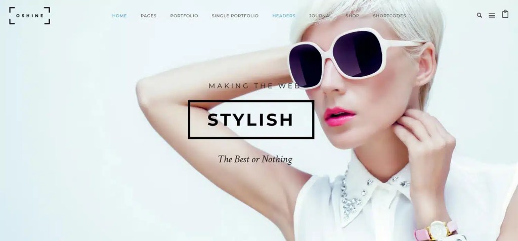 Homepage of the Oshine photography theme displaying a stylish design featuring a woman wearing sunglasses and bold text saying 'MAKING THE WEB STYLISH'.
